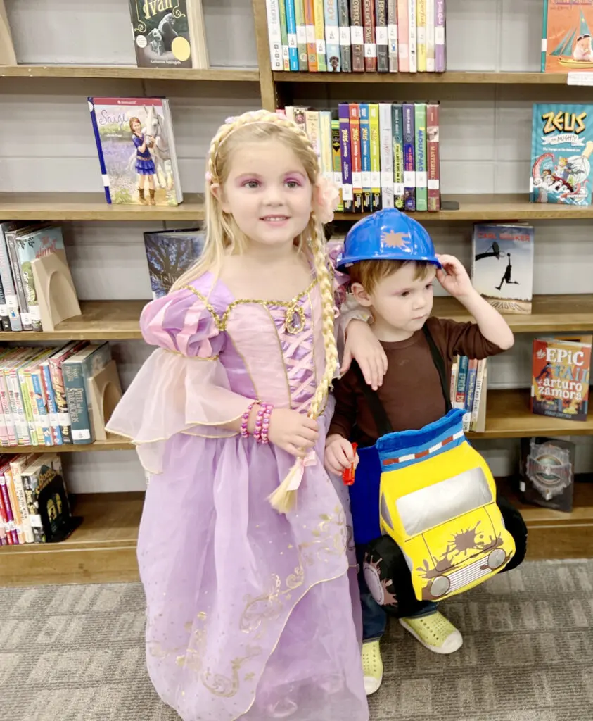 Kids in costume at the Wren Halloween Fest located in Wren Memorial Library.